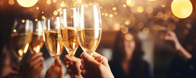 People hold glasses of champagne and make a toast. Champagne with blurred background.Celebrating Christmas or New Year's party. ai generative
